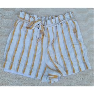 BCBGeneration belted white and yellow striped high waisted shorts